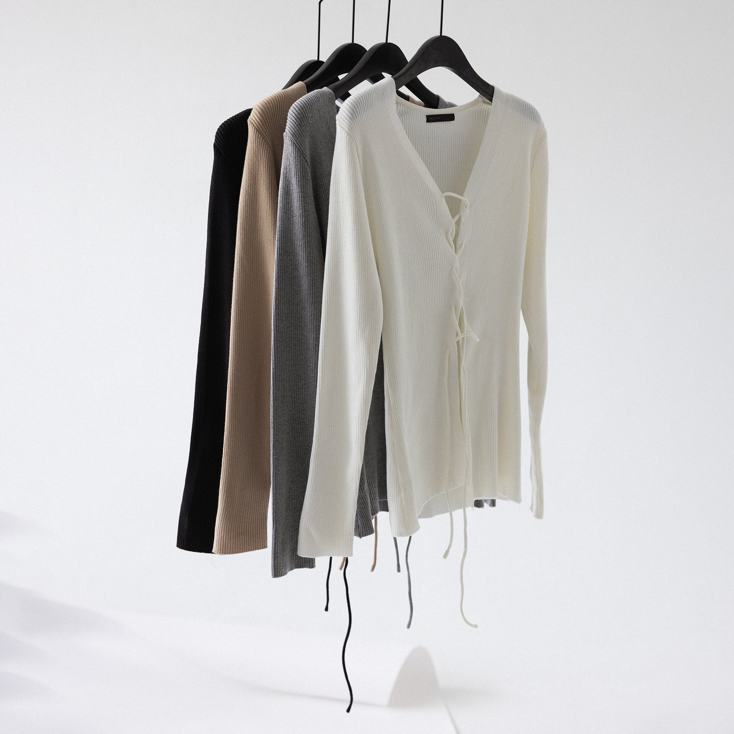RACK Lace-up knit top