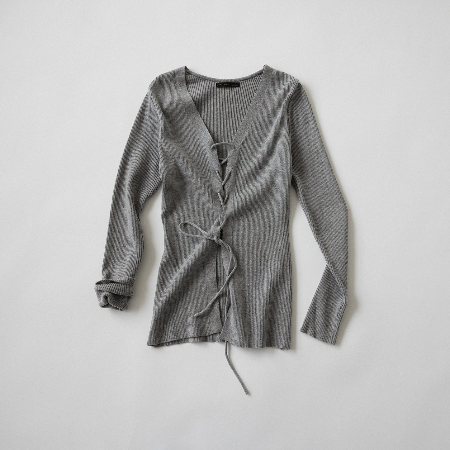 RACK Lace-up knit top