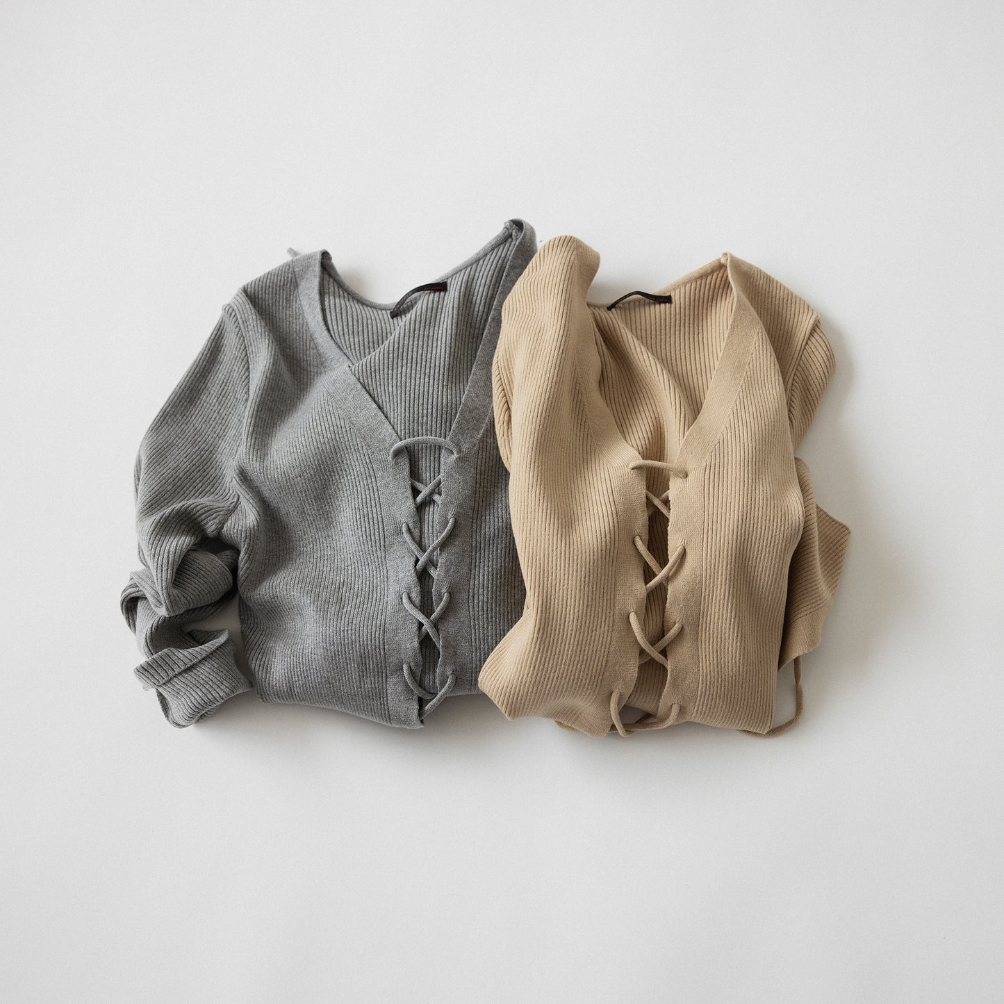 RACK Lace-up knit top