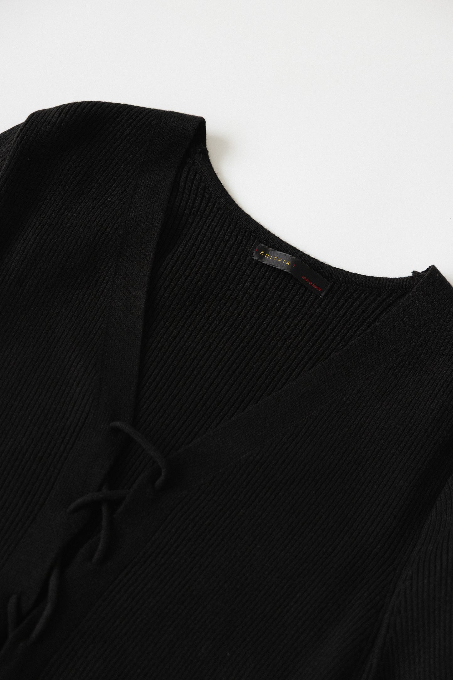 RACK Lace-up knit top