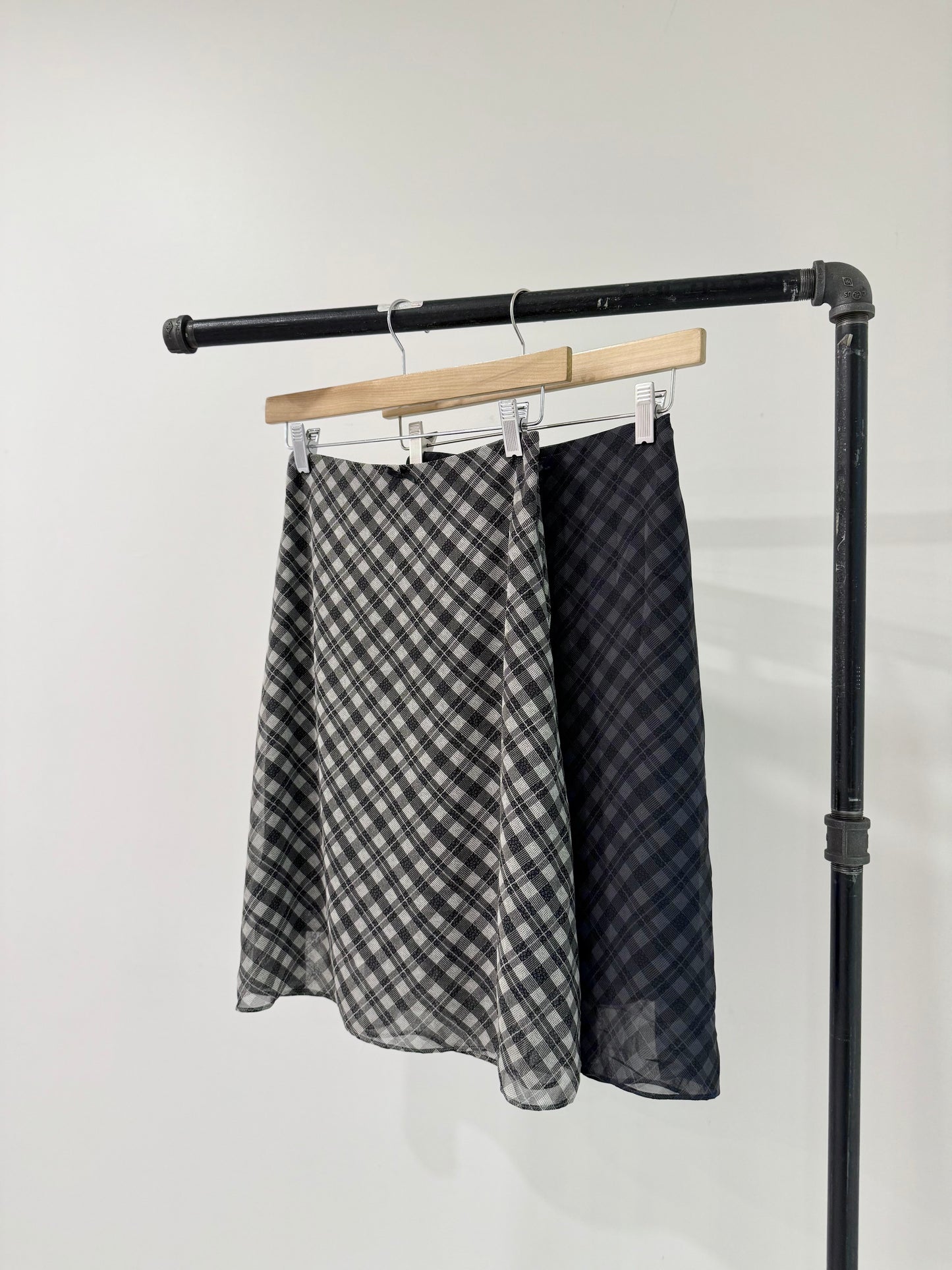 NOOR Plaid midi skirt