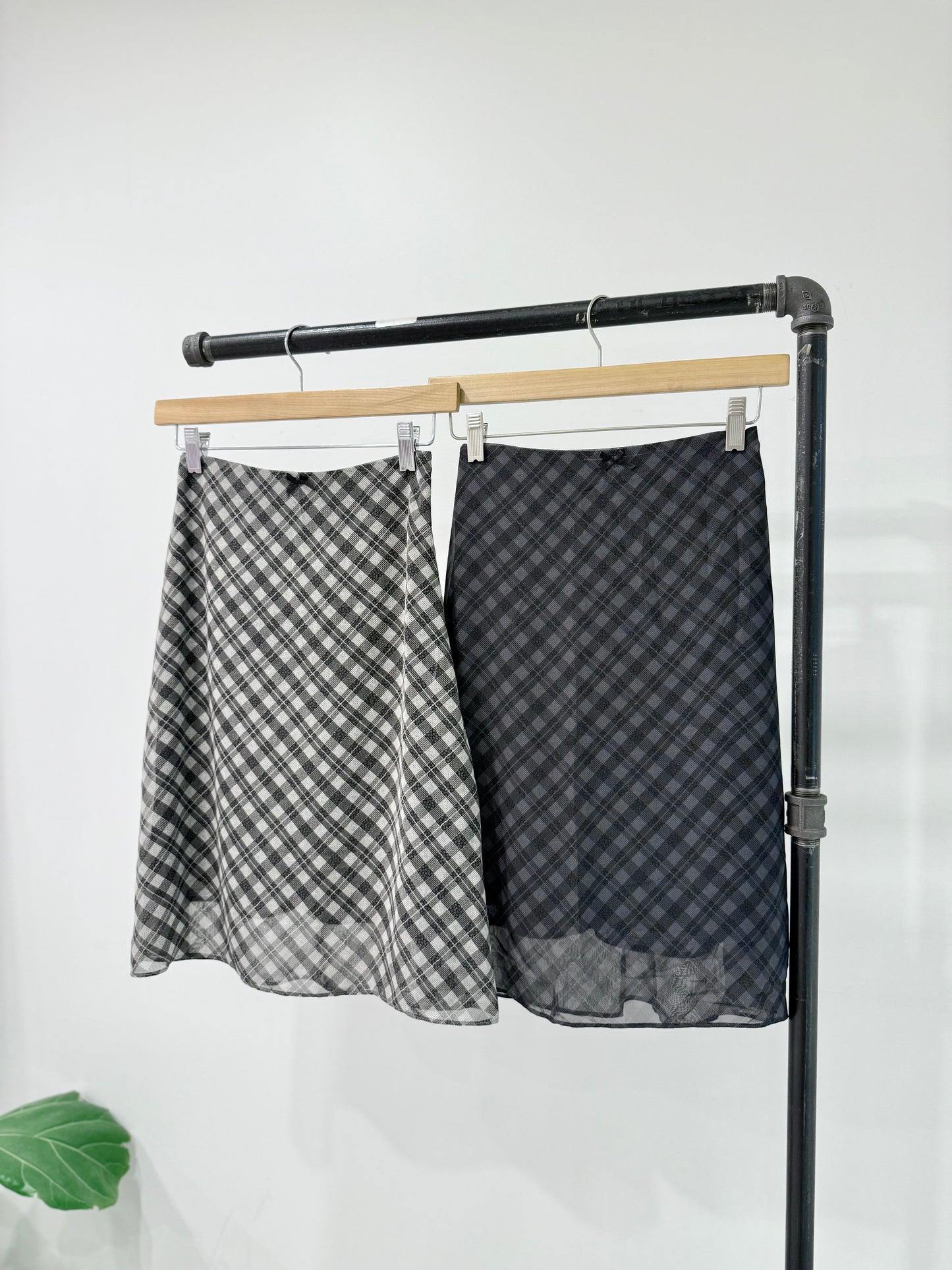 NOOR Plaid midi skirt