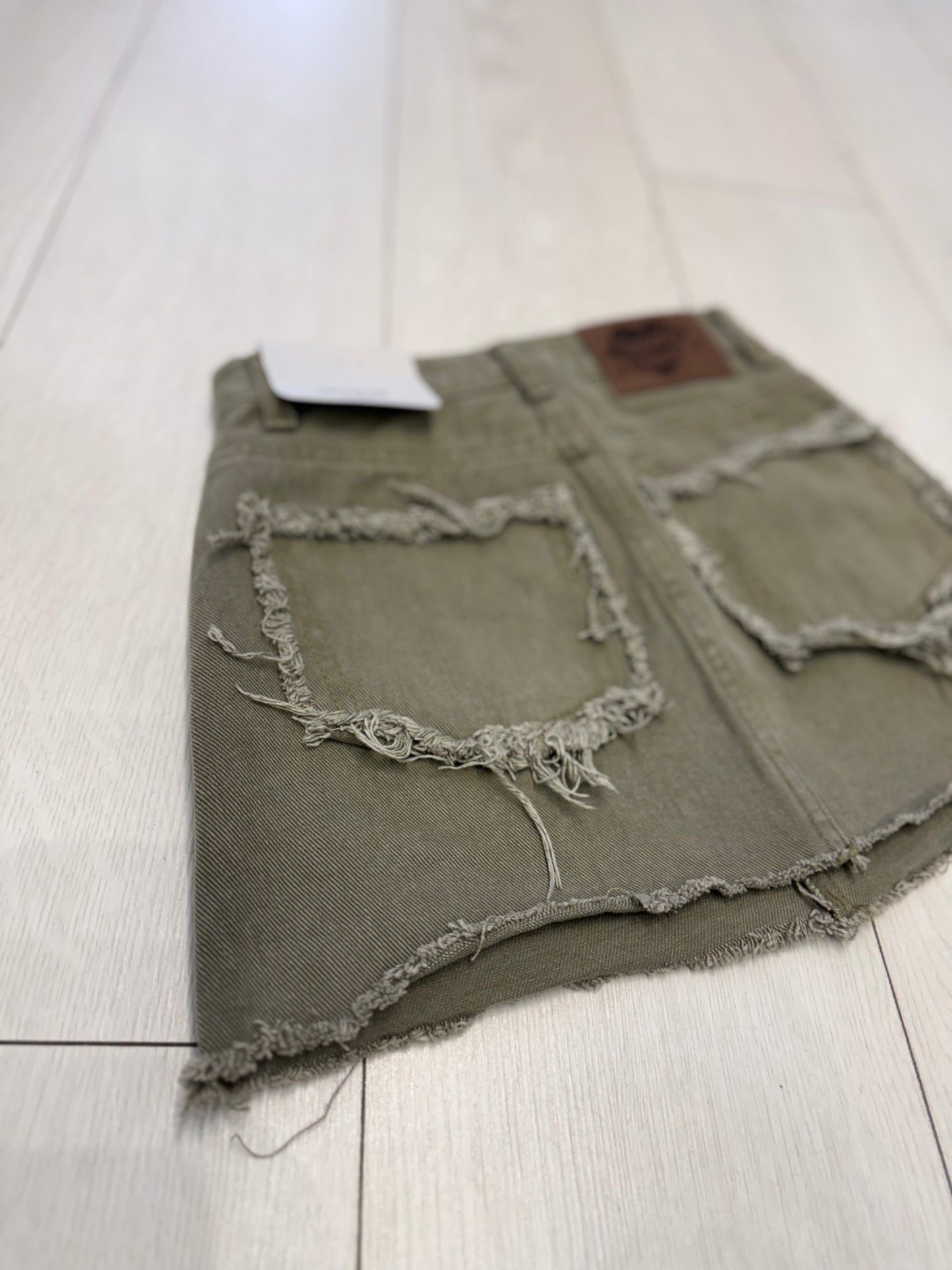 CARLA Studded mini skirt