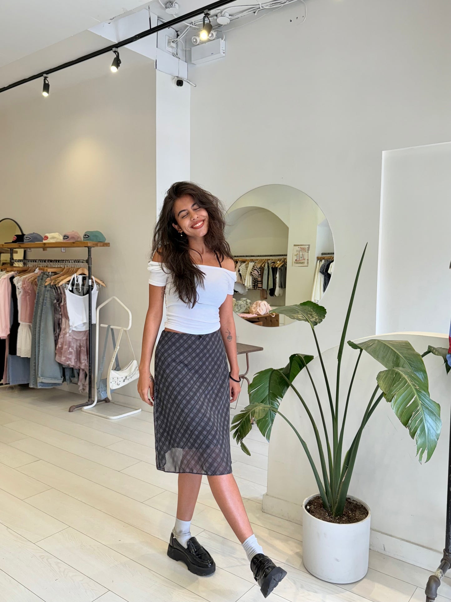 NOOR Plaid midi skirt