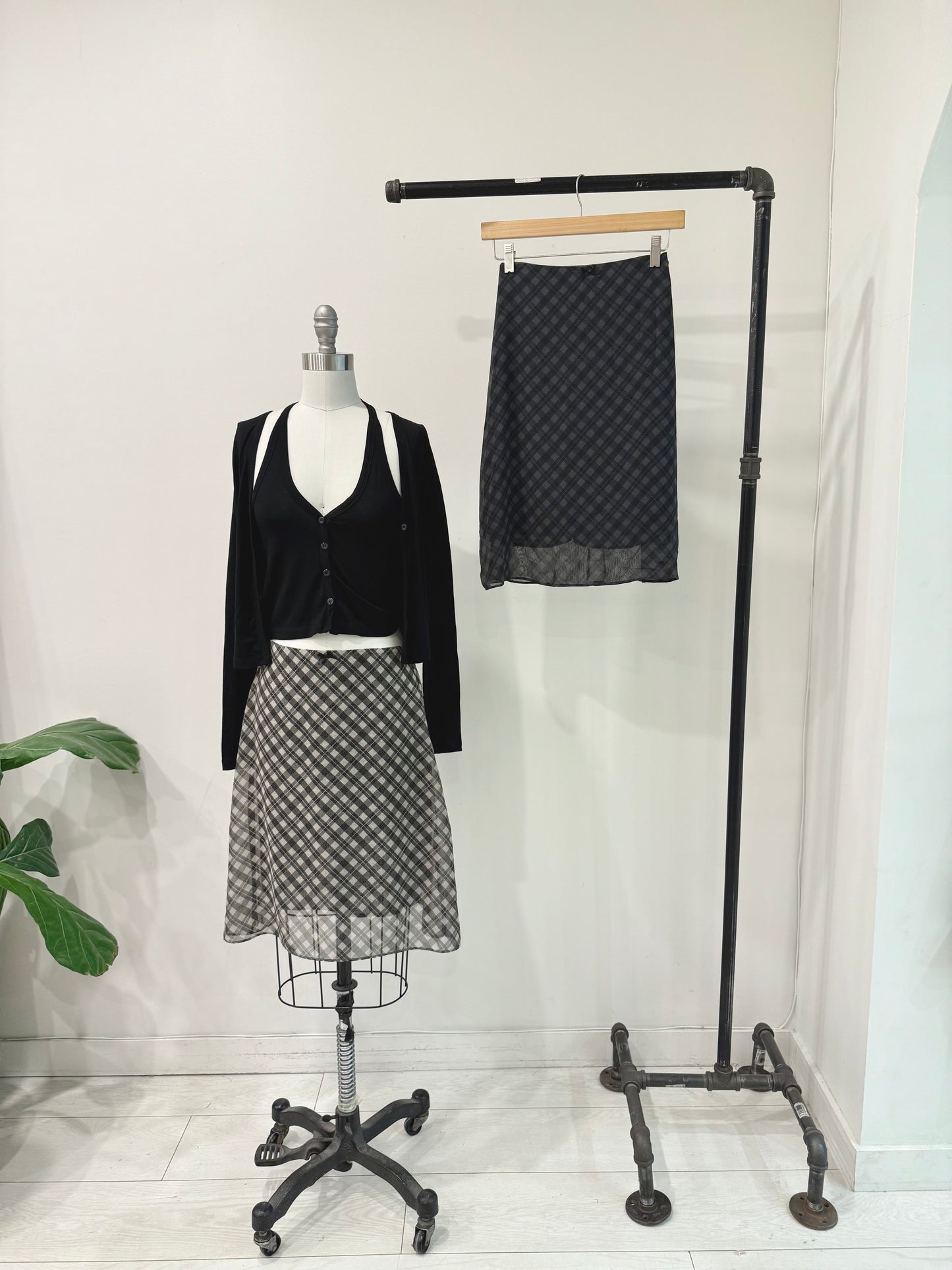 NOOR Plaid midi skirt