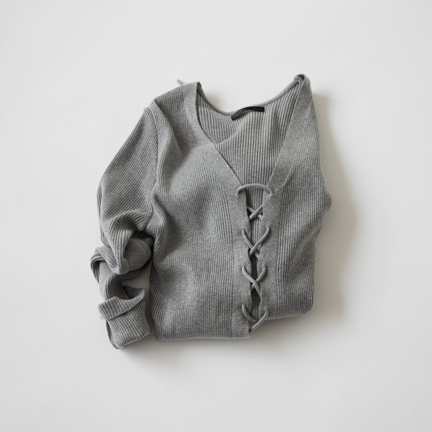 RACK Lace-up knit top