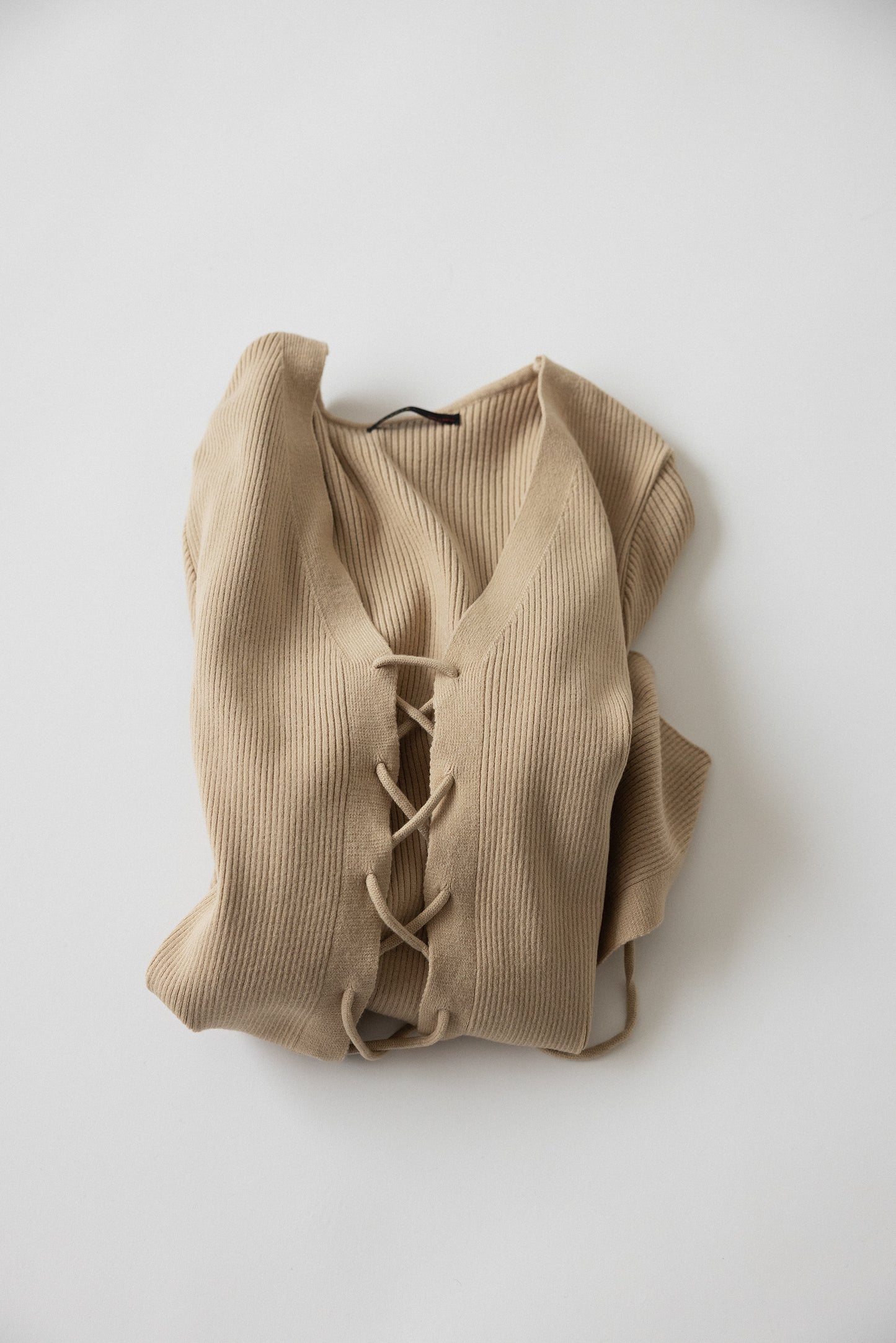 RACK Lace-up knit top