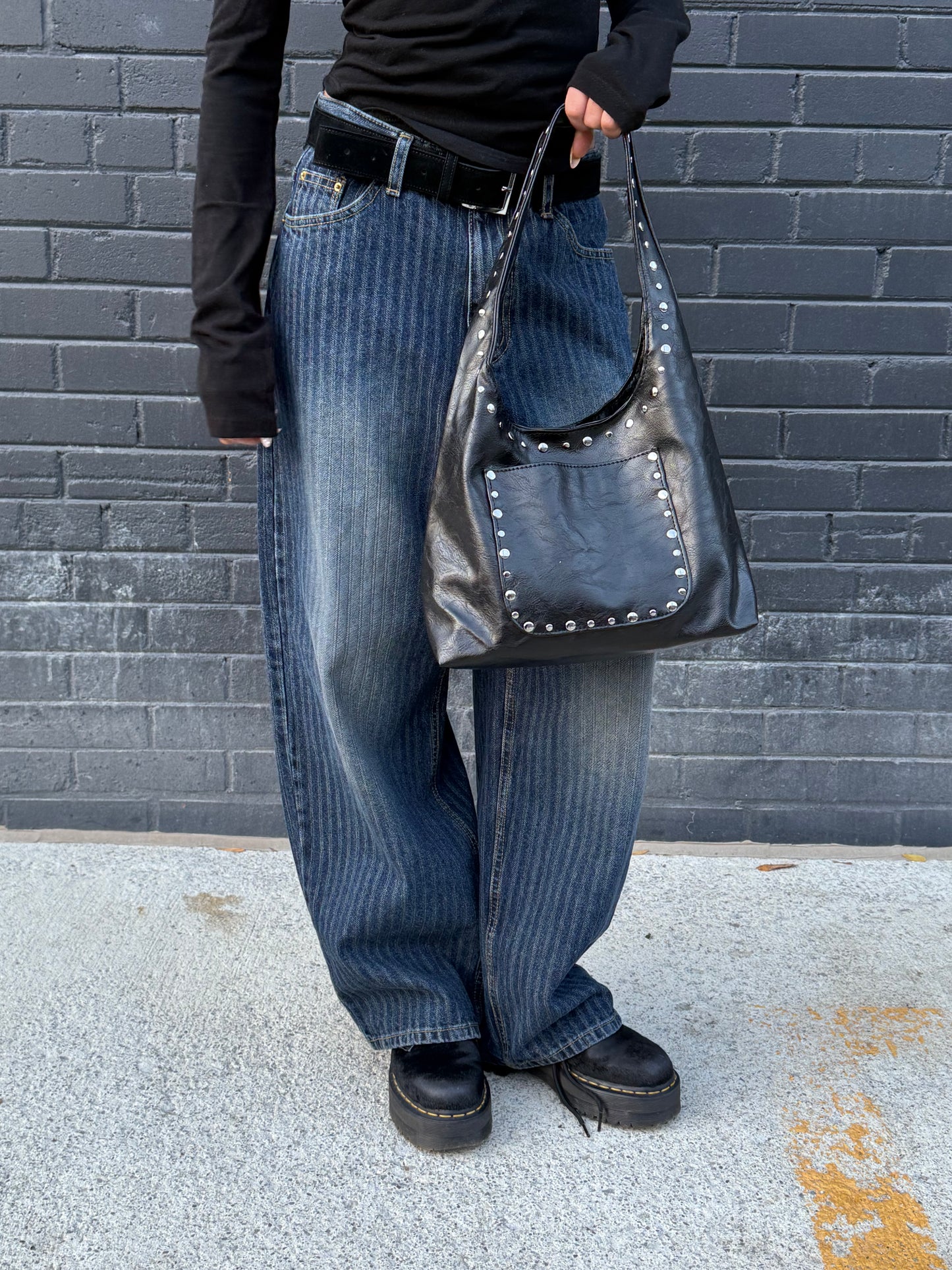 MISHA Studded hobo bag