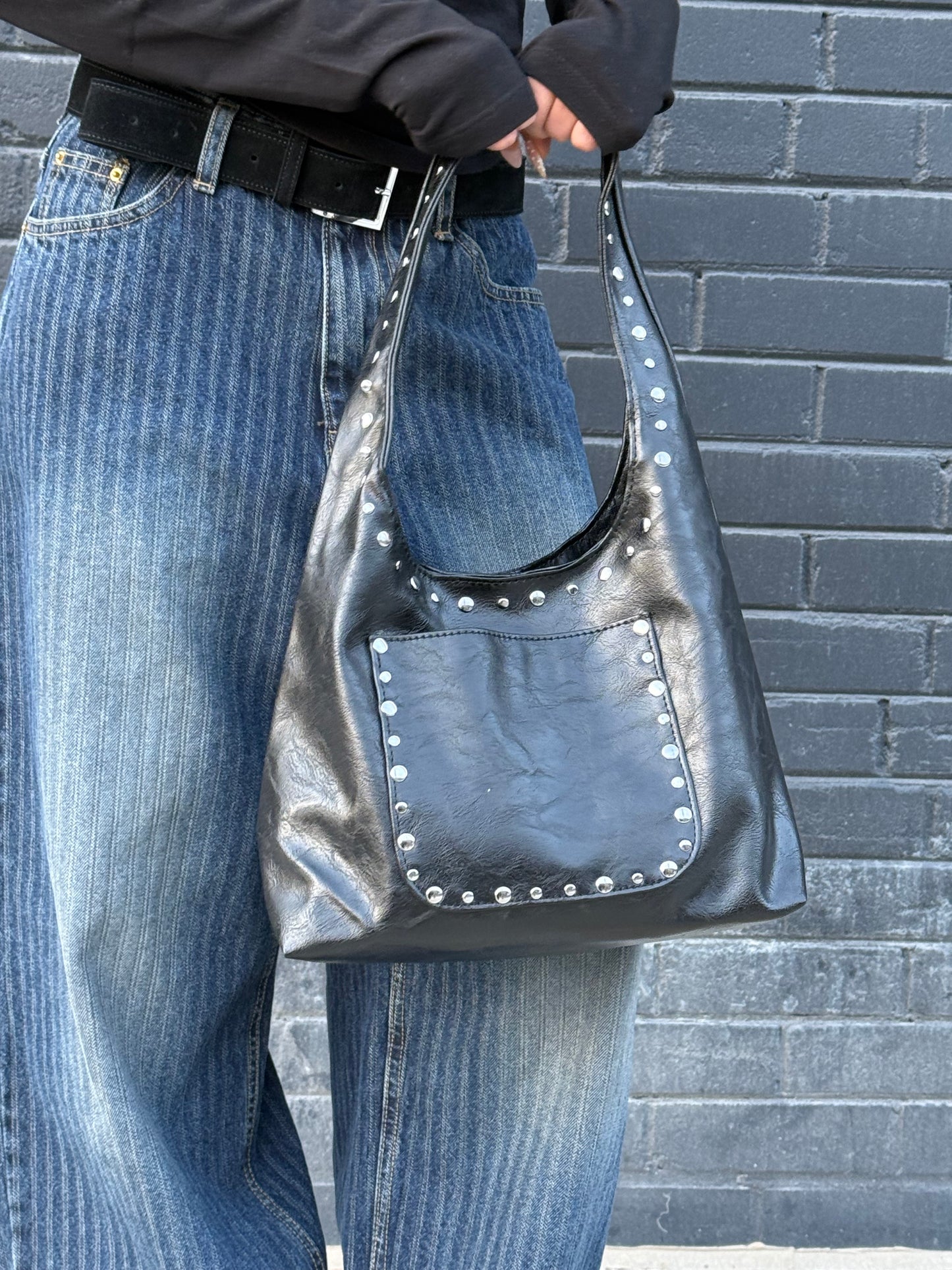 MISHA Studded hobo bag