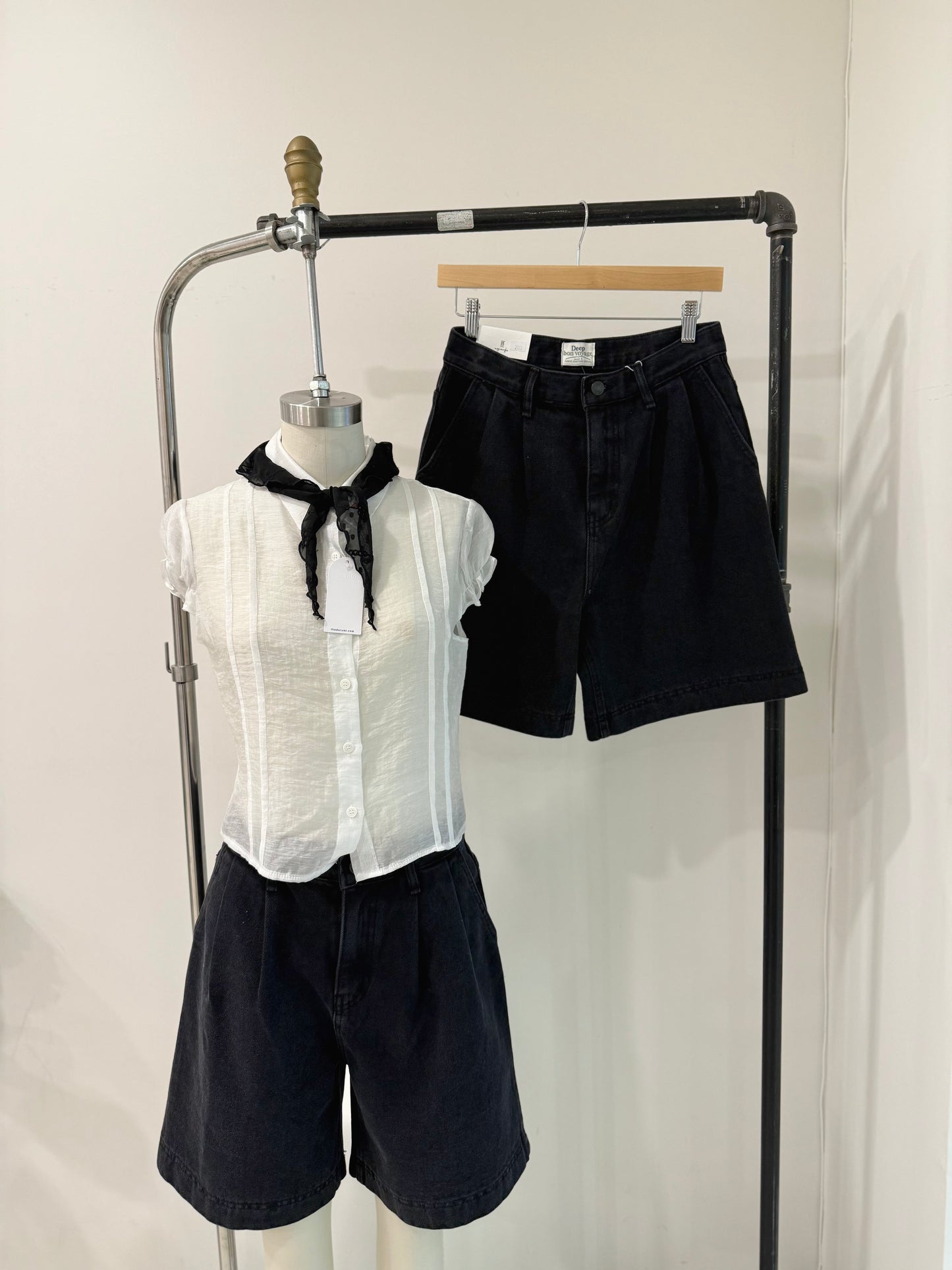 VOICE Black denim shorts