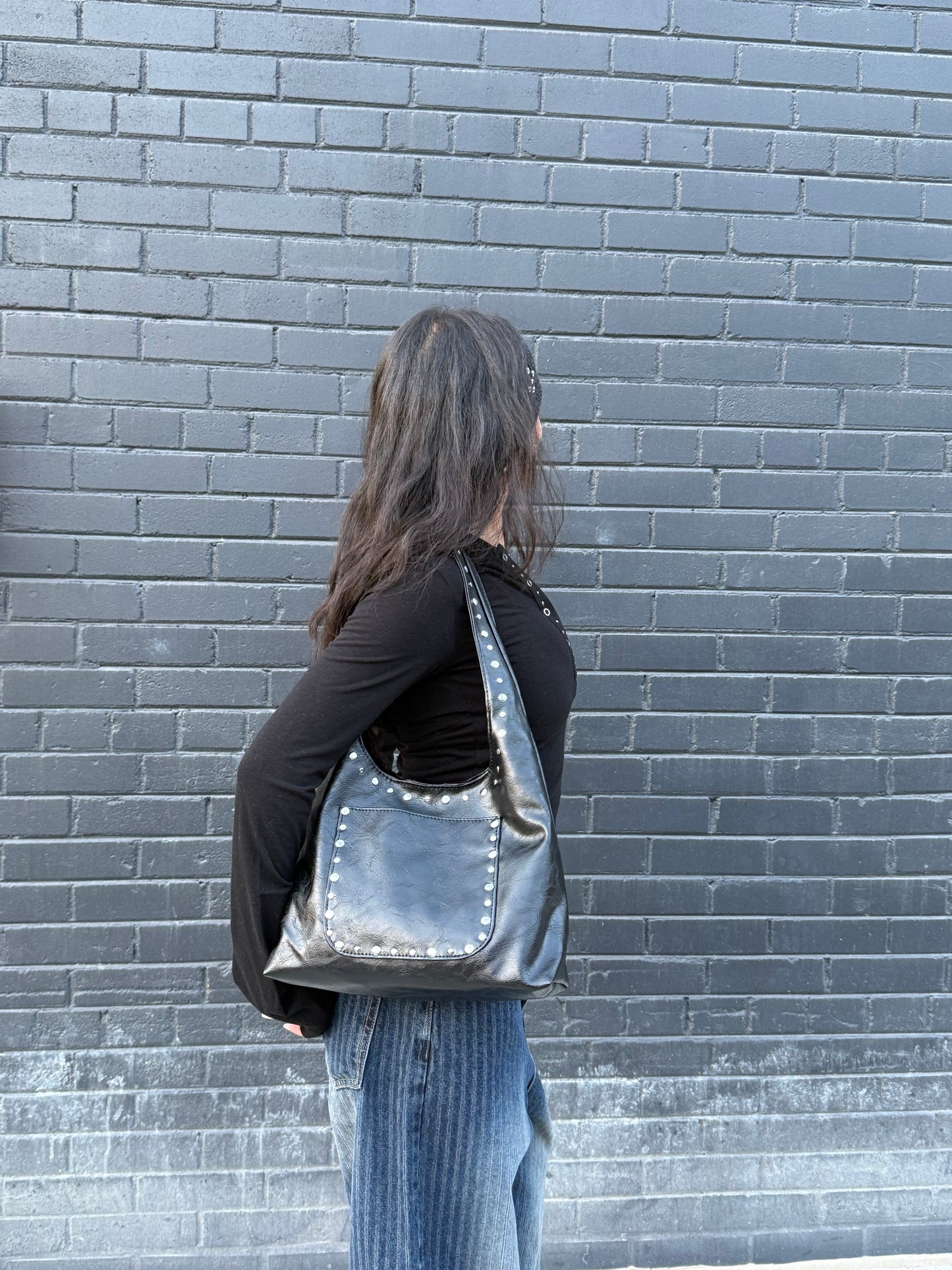 MISHA Studded hobo bag