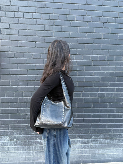 MISHA Studded hobo bag