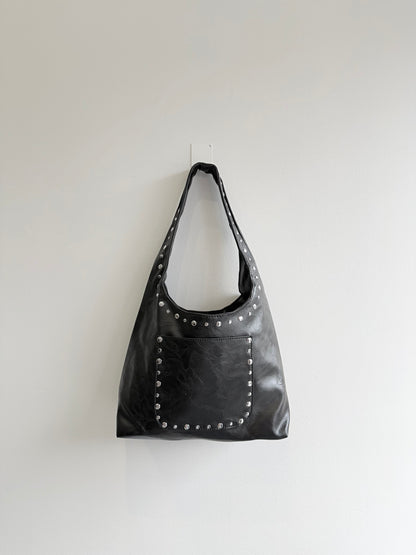 MISHA Studded hobo bag
