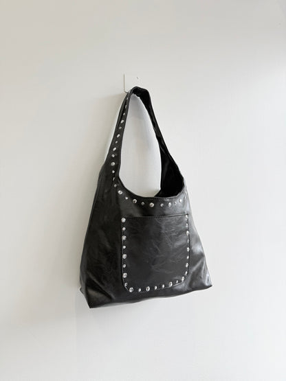 MISHA Studded hobo bag
