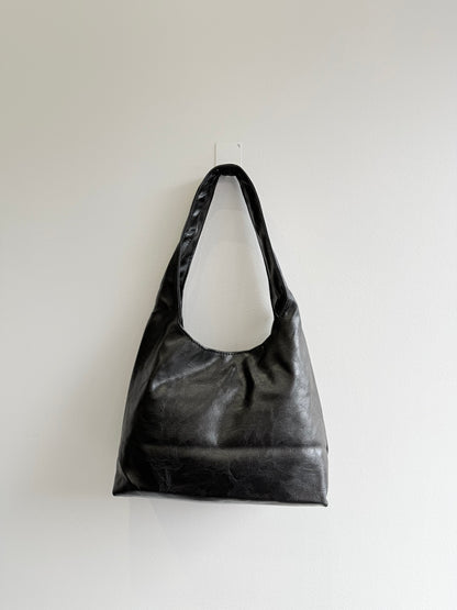 MISHA Studded hobo bag