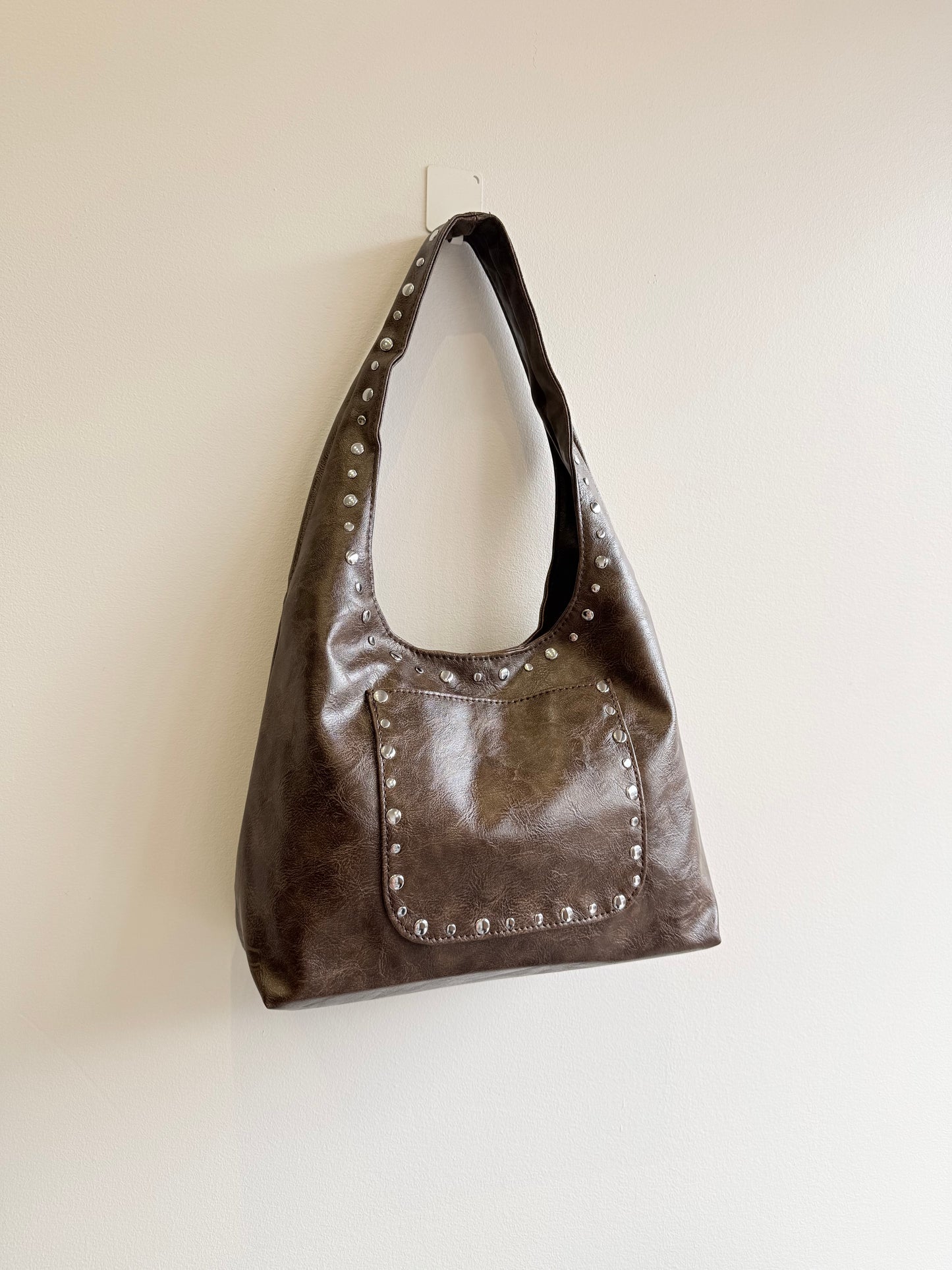 MISHA Studded hobo bag