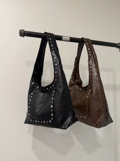 MISHA Studded hobo bag